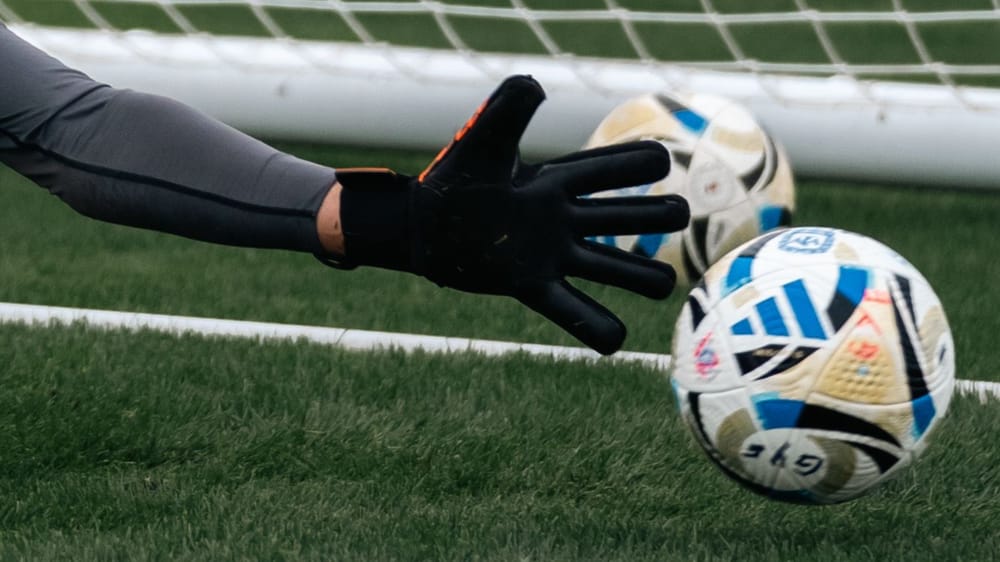 Generic goalkeeper gloves save pexels
